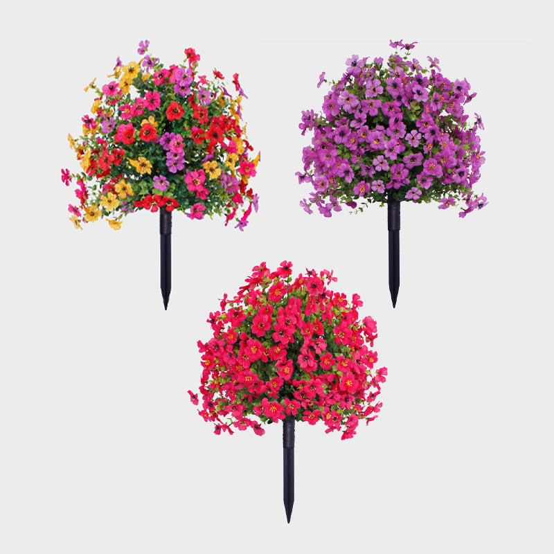 Bloemdecoratie met kunstmatige eucalyptus en viooltjes