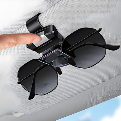 Magnetische zonnebrilhouder voor de zonneklep in de auto