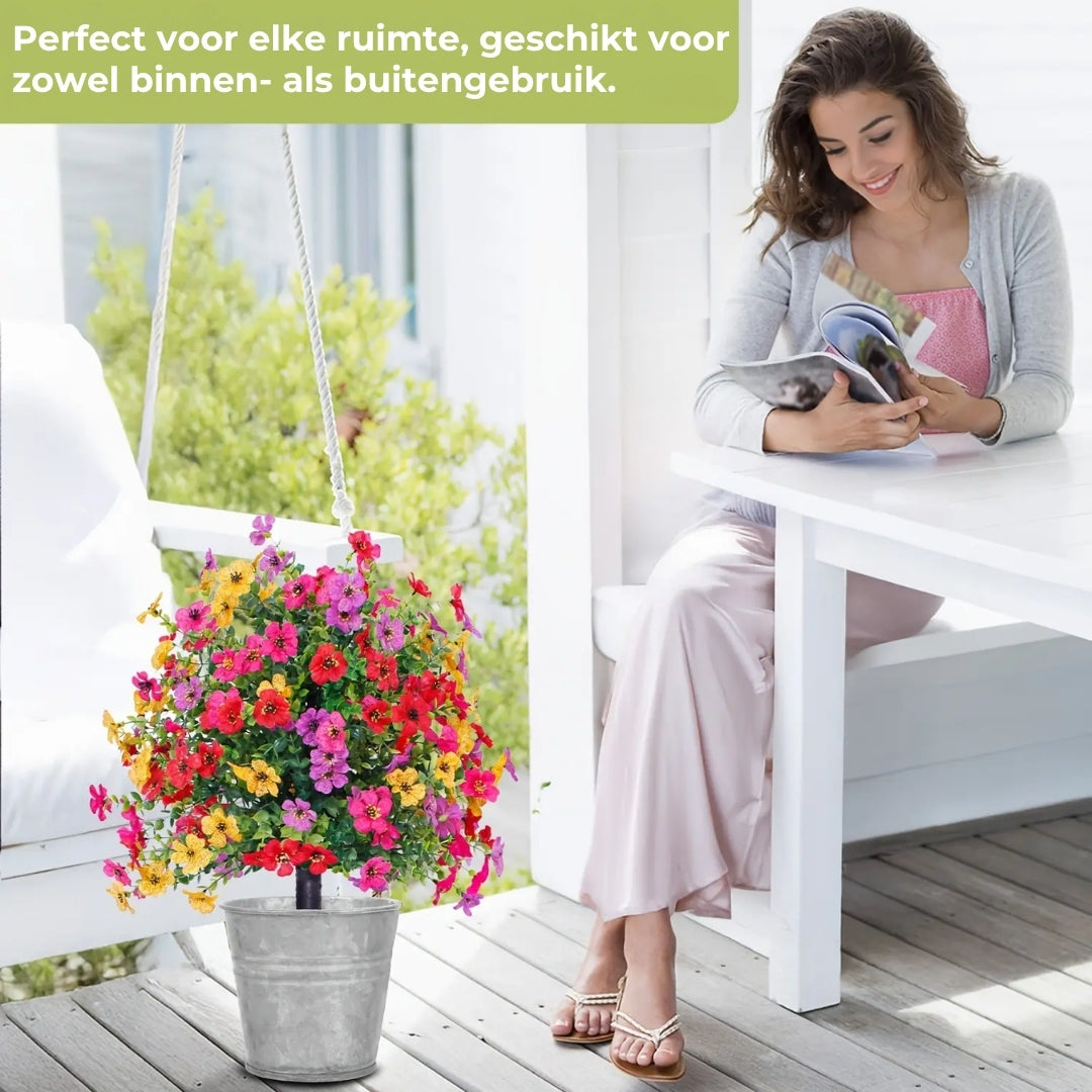 Bloemdecoratie met kunstmatige eucalyptus en viooltjes