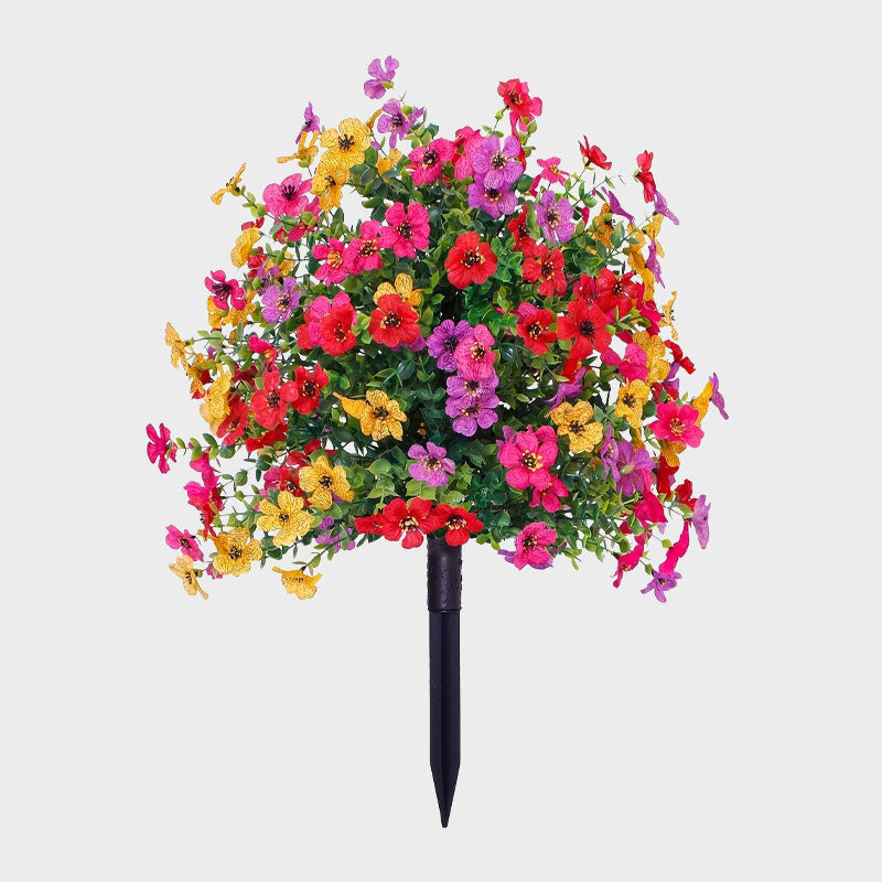 Bloemdecoratie met kunstmatige eucalyptus en viooltjes