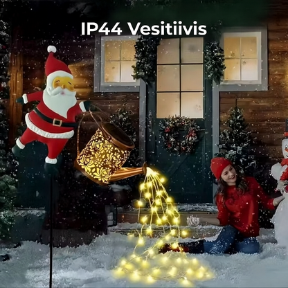 Aurinkokastelukannu-lyhty joulupukki-designilla