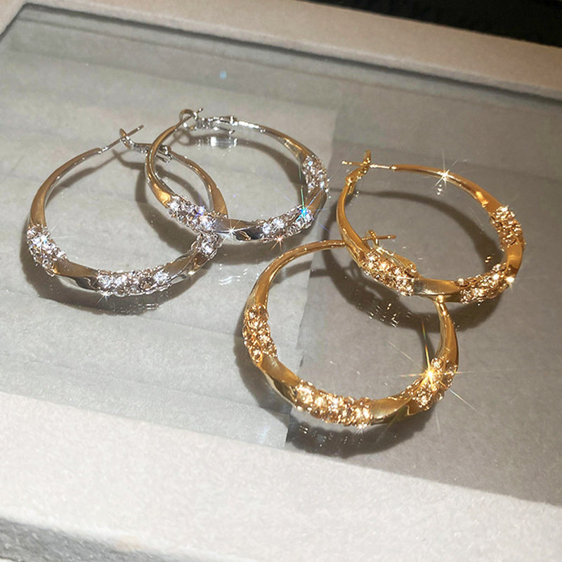 Säihkyvät zirkoniakorvakorut