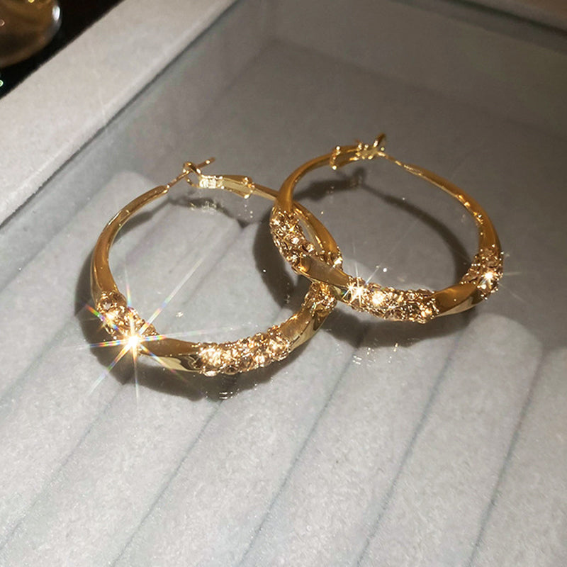 Säihkyvät zirkoniakorvakorut