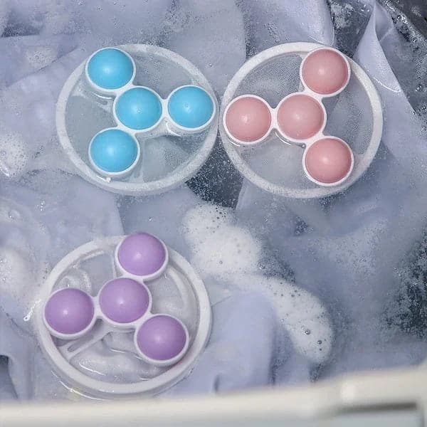 Nukan kerääjä pyykinpesukoneeseen