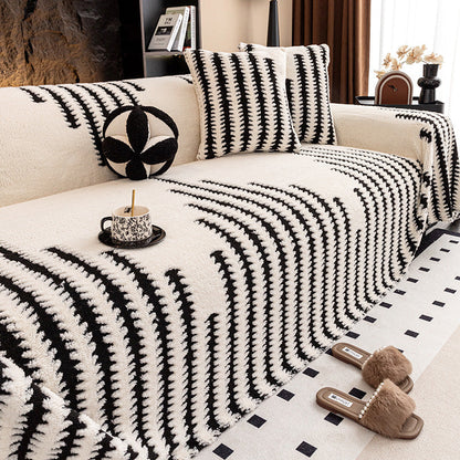 Lemmikinkestävä plyysinen sohvanpäällinen liukuesteellä